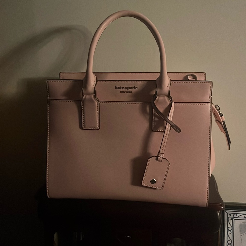 Light pink Kate Spade bag.